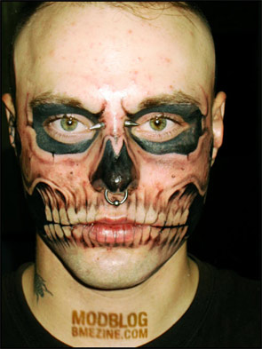Skull Hand Mask Tattoo