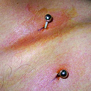 Clavicle piercing by IAM:alienx