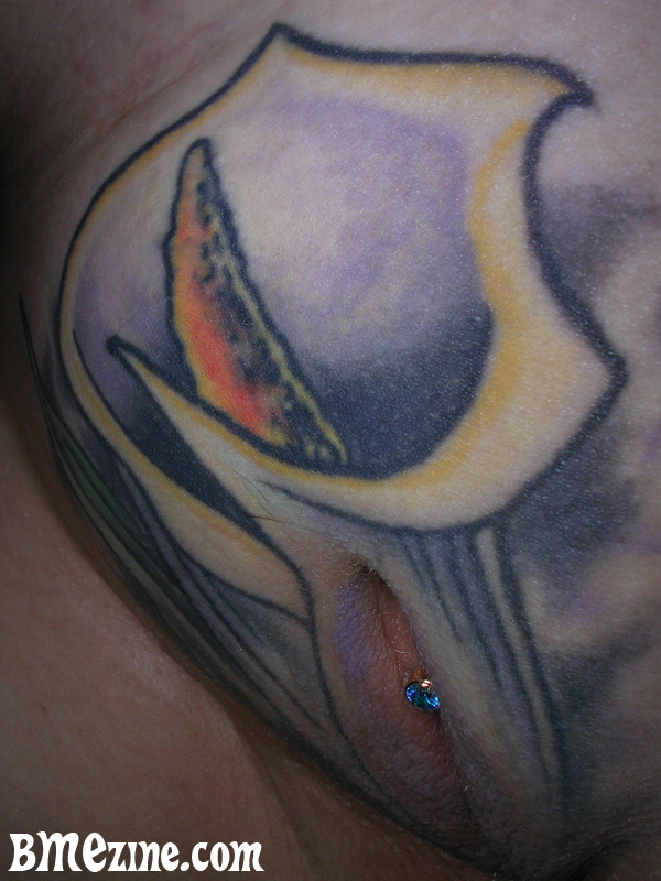 Genital tattoo that goes over the outer labia. 